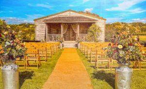 Walk down the aisle at an outdoor wedding ceremony